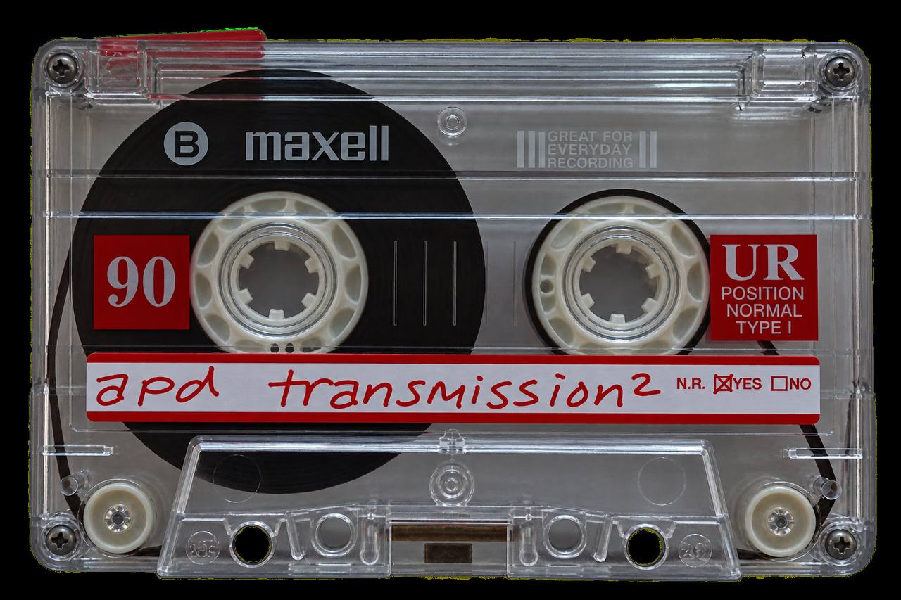 Maxell cassette with handwritten apd transmission squared label